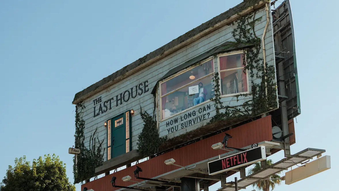 Netflix hired a performer to actually live inside a furnished billboard room 30 feet above the Sunset Strip to promote its new thriller The Last House